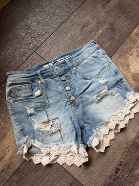 High-Rise Distressed Denim Shorts with Lace Trim - Light Blue
